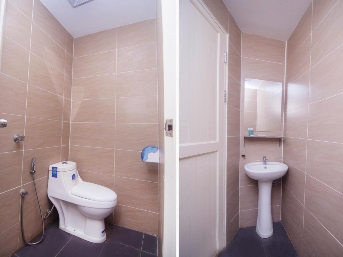 Oyo 836 Mandurah Room & Cafe Кучинг Экстерьер фото