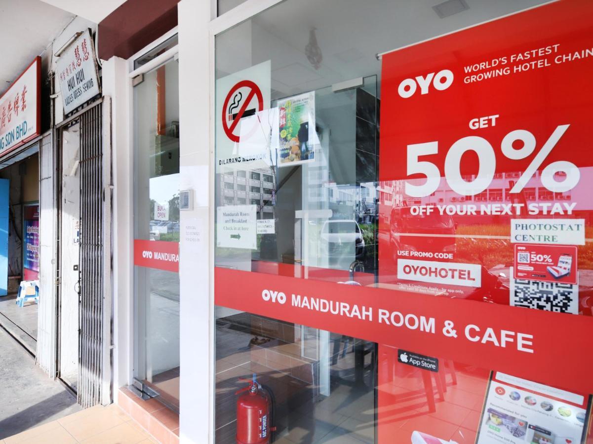 Oyo 836 Mandurah Room & Cafe Кучинг Экстерьер фото